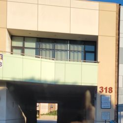 Totalcare ONE Health Center - Parking Entrance & Business sign from street, try not to miss it
