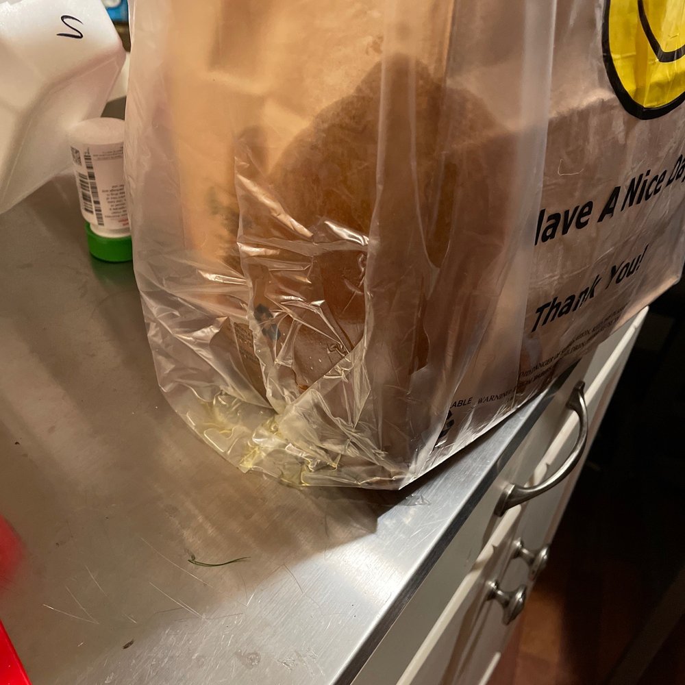 Han Noodle Bar - Oily bags leaking onto counter - Chinese Near Me - Rochester, New York