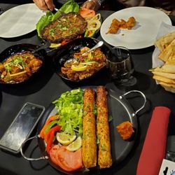 Tawa Modern Indo-Pak Cuisine - Seekh kabab, chapli kabab, goat karahi  and garlic naan