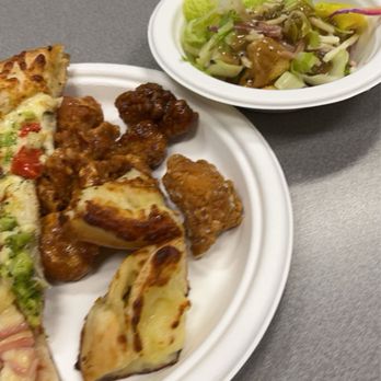 Bucks Pizzeria - a plate of food and a bowl of salad - Pizza Near Me - Chittenango, New York Bucks Pizzeria - a plate of food and a bowl of salad - Pizza Near Me - Chittenango, New York