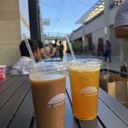 Oolong milk tea & Jasmine Mango Tango Oolong milk tea & Jasmine Mango Tango