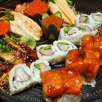 Sakura Home Restaurant - a plate of sushi and rolls - Japanese Near Me - Rochester, New York Sakura Home Restaurant - a plate of sushi and rolls - Japanese Near Me - Rochester, New York