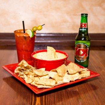 Maria's Cantina - a plate of chips and a bottle of beer - Bars Near Me - El Paso, Texas Maria's Cantina - a plate of chips and a bottle of beer - Bars Near Me - El Paso, Texas