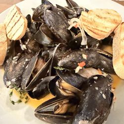 The Arlington - Mussels with garlic , white wine and Calabrian chili peppers . 10 out of 10