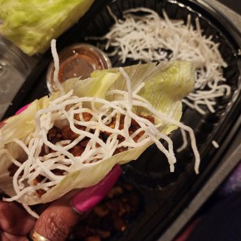 Pei Wei Asian Kitchen - Chicken lettuce wraps topped with rice sticks - Chinese Near Me - Tampa, Florida Pei Wei Asian Kitchen - Chicken lettuce wraps topped with rice sticks - Chinese Near Me - Tampa, Florida