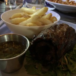 The rolling of this skirt steak is a tactic to make it look thick. Unroll it and it's a think piece of Palomilla The rolling of this skirt steak is a tactic to make it look thick. Unroll it and it's a think piece of Palomilla