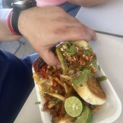 El Movimiento Hotdog - What a place.   Some of the best hot dogs I have ever had in my life.  Please give yourselves an opportunity and enjoy the experience