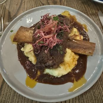 Luogo - Short Ribs braised with a demiglace aauce and pickled onions - Italian Near Me - Nashville, Tennessee Luogo - Short Ribs braised with a demiglace aauce and pickled onions - Italian Near Me - Nashville, Tennessee