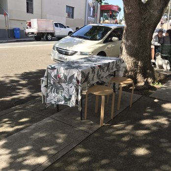 Cafe Claire - Fold out table on a slant - Cafes Near Me - Annandale, NSW