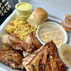 Pollo Tropical - Half Chicken With 2 Sides-dark meat. Yellow Rice & Vegetables and Corn.