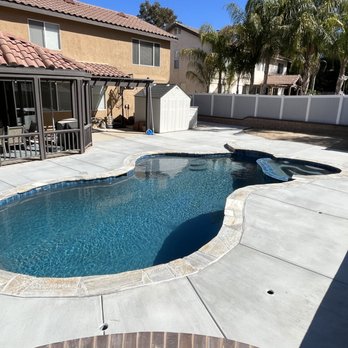 California Pools - Corona - The tropics blue mini pebble is gorgeous and the colors in the flagstone are a gorgeous combination! - General Contractors Near Me - Corona, California