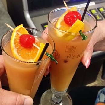 Pomegranate Restaurant - Having some Pomegranate Mimosas while trying our luck at the slot machines! - American Near Me - Aurora, Illinois Pomegranate Restaurant - Having some Pomegranate Mimosas while trying our luck at the slot machines! - American Near Me - Aurora, Illinois