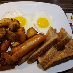 Watts Restaurant - All day breakfast. Egg whites not fully cooked :(