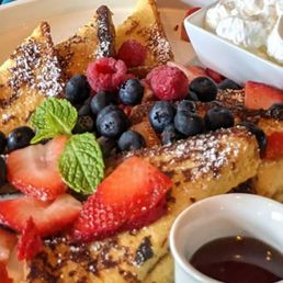 Tres leches French toast with berries, maple syrup and cream Tres leches French toast with berries, maple syrup and cream