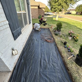 Linear Lawn & Landscaping - Midway through a garden installation. 5mil weedmat and dripline are is the foundation for a great garden! - Lawn Services Near Me Linear Lawn & Landscaping - Midway through a garden installation. 5mil weedmat and dripline are is the foundation for a great garden! - Lawn Services Near Me