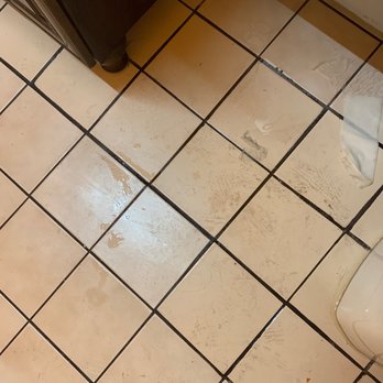 Sonsonate Grill - a dirty bathroom floor - Salvadoran Near Me - Los Angeles, California
