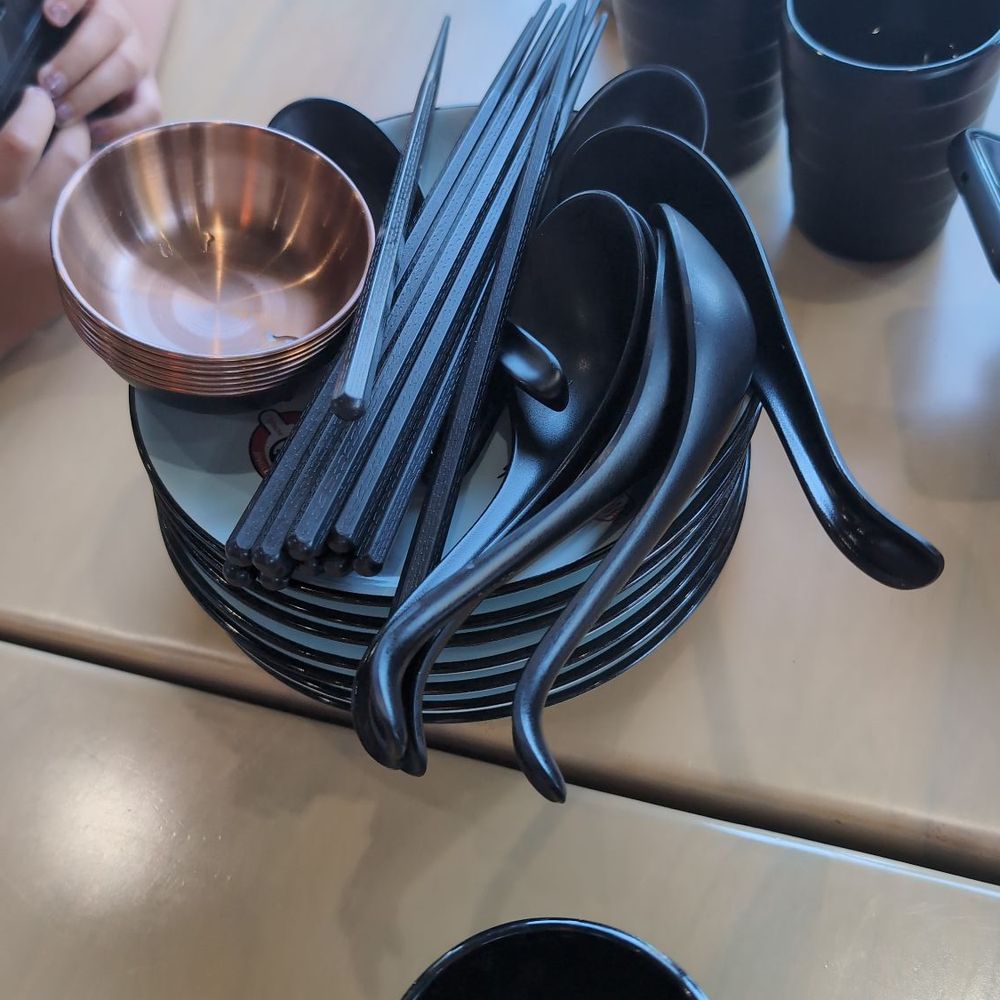 Jingle Bao - Plates, cups water, and utensils pre-set on table - Chinese Near Me - Fresno, California