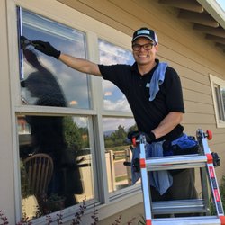 Garden City Window Cleaning - Josh cleaning windows.