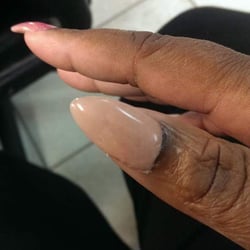 Worst place to get nails done ever! First off a fill is 30. A. Full set is 25. I just got a fill look how my nails look!