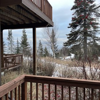 Cascade Vacation Rentals - View from enclosed patio, has a small view of Lake Superior. - Resorts Near Me - Lutsen, Minnesota Cascade Vacation Rentals - View from enclosed patio, has a small view of Lake Superior. - Resorts Near Me - Lutsen, Minnesota