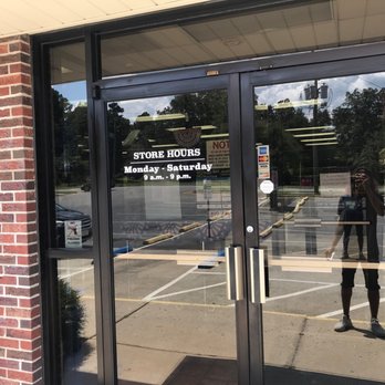 ABC Store - a reflection of a woman in the glass door - Beer, Wine & Spirits Near Me - Biscoe, North Carolina ABC Store - a reflection of a woman in the glass door - Beer, Wine & Spirits Near Me - Biscoe, North Carolina