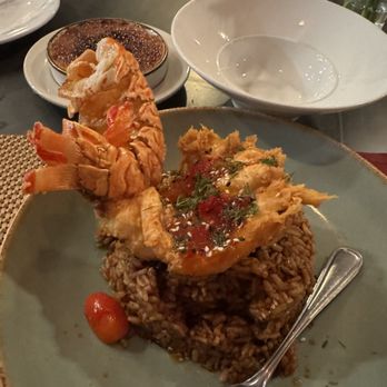 Voyce Bistro - Lobster Tail (took a bite of rice before the picture so it's not as perfect looking as it was!) - Seafood Near Me - Wilmington, North Carolina Voyce Bistro - Lobster Tail (took a bite of rice before the picture so it's not as perfect looking as it was!) - Seafood Near Me - Wilmington, North Carolina