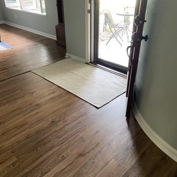 Peartree Construction & Development - a living room with hardwood floors - General Contractors Near Me