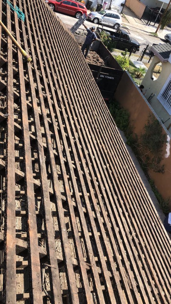 Slide of Alex's Hauling & Demo