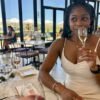 Domaine Carneros - Enjoying a class of Le Rêve Blanc de Blanc with the caviar sampler - Wineries Near Me - Napa, California Domaine Carneros - Enjoying a class of Le Rêve Blanc de Blanc with the caviar sampler - Wineries Near Me - Napa, California