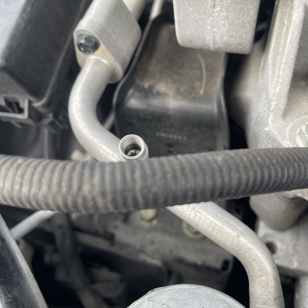 RPM Automotive - Missing AC service cap - Auto Repair Near Me - Fleming Island, Florida RPM Automotive - Missing AC service cap - Auto Repair Near Me - Fleming Island, Florida