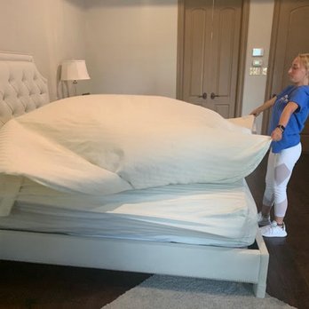 Maid Zen Cleaning Service - Making the bed with clean sheets - Home Cleaning Near Me Maid Zen Cleaning Service - Making the bed with clean sheets - Home Cleaning Near Me