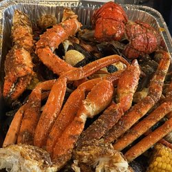Pier 88 Boiling Seafood & Bar - Palmdale - 8 person feast: 88 special seasoned king crab, crawfish, shrimp, mussels, clams, lobster, sausage, corn & potatoes.