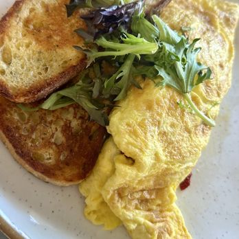Madeleine Cafebistro - Sun-dried tomato and goat cheese omelette - Breakfast & Brunch Near Me - San Juan, Puerto Rico Madeleine Cafebistro - Sun-dried tomato and goat cheese omelette - Breakfast & Brunch Near Me - San Juan, Puerto Rico
