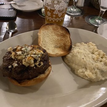 Scratch Steakhouse And Lounge - Cajun bleu burger with a side of garlic mashed potatoes - Lounges Near Me - Louisville, Ohio Scratch Steakhouse And Lounge - Cajun bleu burger with a side of garlic mashed potatoes - Lounges Near Me - Louisville, Ohio