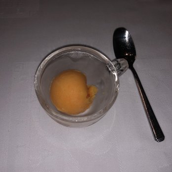 Gustino - orange sorbet given before our entrees - Italian Near Me - Cancún, ROO Gustino - orange sorbet given before our entrees - Italian Near Me - Cancún, ROO
