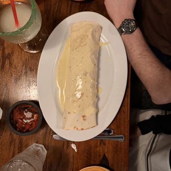 Don Pepe - This is a Senior Burrito! It is the largest burrito we've ever seen. And it was delicious!! Two people had to split this one!! - Mexican Near Me - Hoover, Alabama