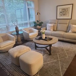 MJM FURNITURE - Leather reclining couch matches all our furniture.