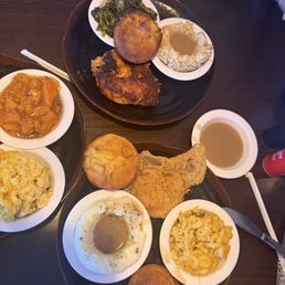 Mac and cheese, collards, fried chicken, mashed potatoes and gravy, candied yams, corn bread, baked chicken, pork chop Mac and cheese, collards, fried chicken, mashed potatoes and gravy, candied yams, corn bread, baked chicken, pork chop