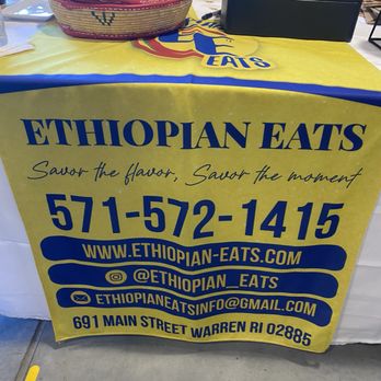 Ethiopian Eats - a table with a hat on it - Food Stands Near Me - Providence, Rhode Island Ethiopian Eats - a table with a hat on it - Food Stands Near Me - Providence, Rhode Island