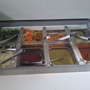 Taqueria Los Amigos - Sauce and condiment station - Mexican Near Me - Orlando, Florida Taqueria Los Amigos - Sauce and condiment station - Mexican Near Me - Orlando, Florida