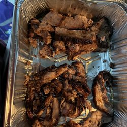 Scoot's BBQ - Smoked brisket, the top portion is meat and the bottom is all pure inedible fat.