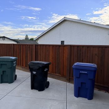 Classic Fence Co. - The backyard fence stained after some new redwood boards were installed. - Fences & Gates Near Me - Rancho Cordova, California Classic Fence Co. - The backyard fence stained after some new redwood boards were installed. - Fences & Gates Near Me - Rancho Cordova, California