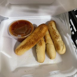 Parmesan breadsticks which were advertised to have garlic (they didn't). Parmesan breadsticks which were advertised to have garlic (they didn't).
