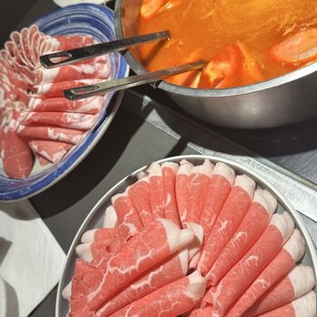Happy Lamb Hot Pot - Bunch of different meat and the tomato stock - Hot Pot Near Me - Naperville, Illinois