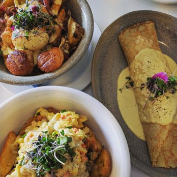 OEB Breakfast - Bridgeland - Scallops and poached eggs poutine, lobster shrimp scramble poutine with truffle crepe. - Breakfast & Brunch Near Me - Calgary, Alberta OEB Breakfast - Bridgeland - Scallops and poached eggs poutine, lobster shrimp scramble poutine with truffle crepe. - Breakfast & Brunch Near Me - Calgary, Alberta