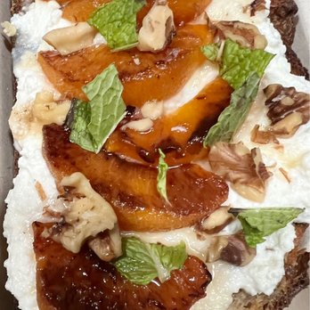 Nelson the Seagull - Peaches on Toast! ricotta studded with crushed walnuts under roasted peaches drizzled with honey, mint - Coffee & Tea Near Me - Vancouver, British Columbia Nelson the Seagull - Peaches on Toast! ricotta studded with crushed walnuts under roasted peaches drizzled with honey, mint - Coffee & Tea Near Me - Vancouver, British Columbia