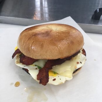 Pressed For Time - Crispy bacon egg and American cheese on a plain bagel - Coffee & Tea Near Me - Derry, New Hampshire Pressed For Time - Crispy bacon egg and American cheese on a plain bagel - Coffee & Tea Near Me - Derry, New Hampshire