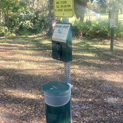Arlington Paw Park - Nice poop bag dispenser and trash can as you walk down the path to the dog park