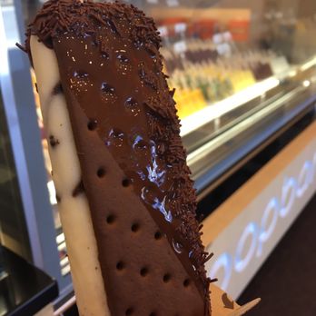 Popbar - Cookies and cream popwich dipped in milk chocolate with sprinkles - Desserts Near Me - Midland, Texas Popbar - Cookies and cream popwich dipped in milk chocolate with sprinkles - Desserts Near Me - Midland, Texas