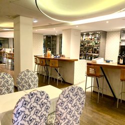 Restaurante Santiago - Navy. Whites. Woods.
